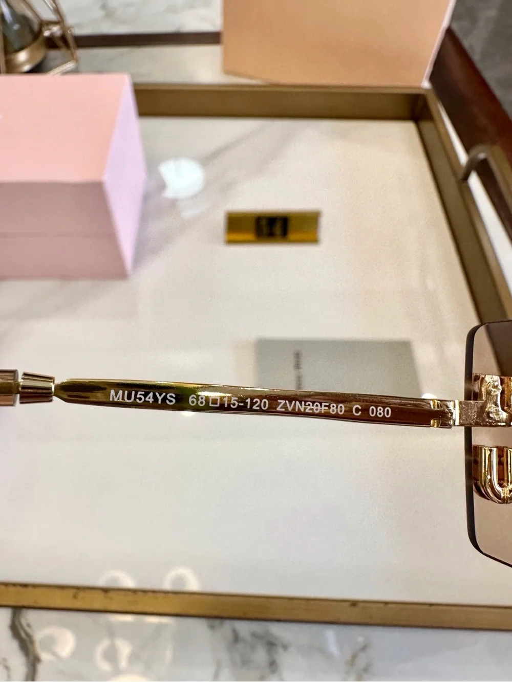 Miu Miu Rimless Sunglasses with Pink-Brown Lenses and Gold Accents - Picture 7 of 8